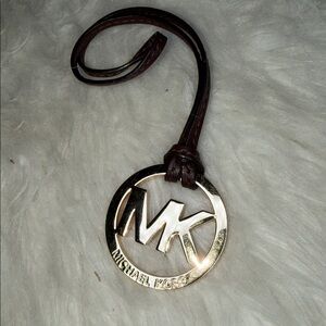Michael Kors EUC hang tag with brown leather and gold for bag